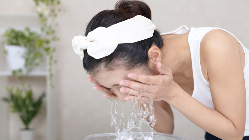 A woman doing the face wash test to figure out her skin type