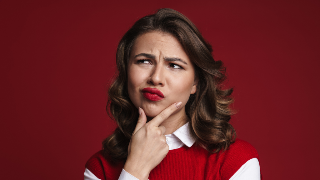 A woman wondering why sensitive skin and dehydrated skin aren't included in our skin type list