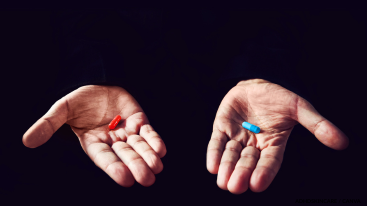 Hands holding different pills representing medication choice in an Adderall skincare routine.