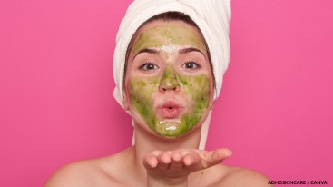 Woman with green mask blowing a kiss, adding fun to ADHD skincare.